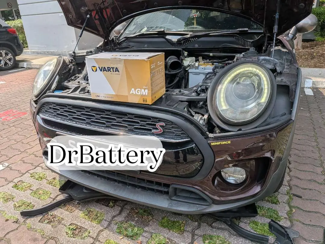 VARTA battery beside a Mini during an onsite battery service